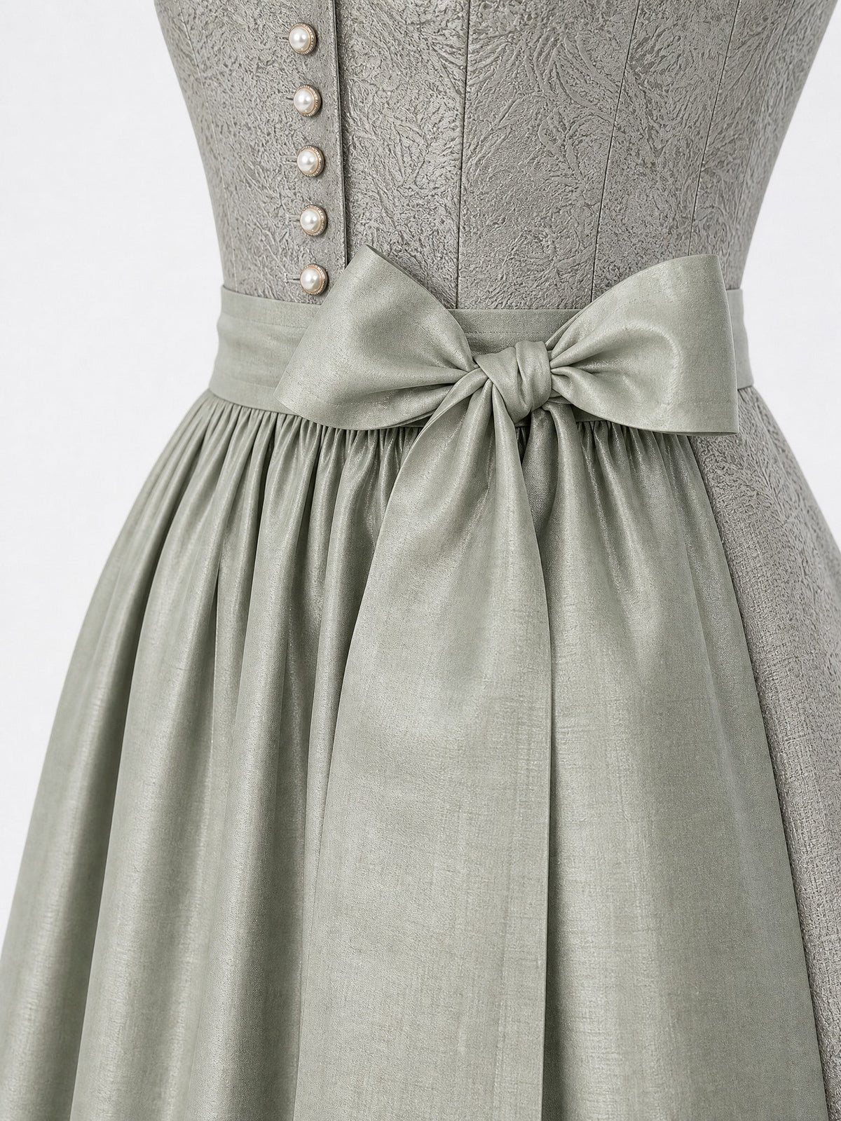 Dirndl Elena in Flechtengrau mit Salbeigrün Schürze - Detailansicht Taille und Schleife