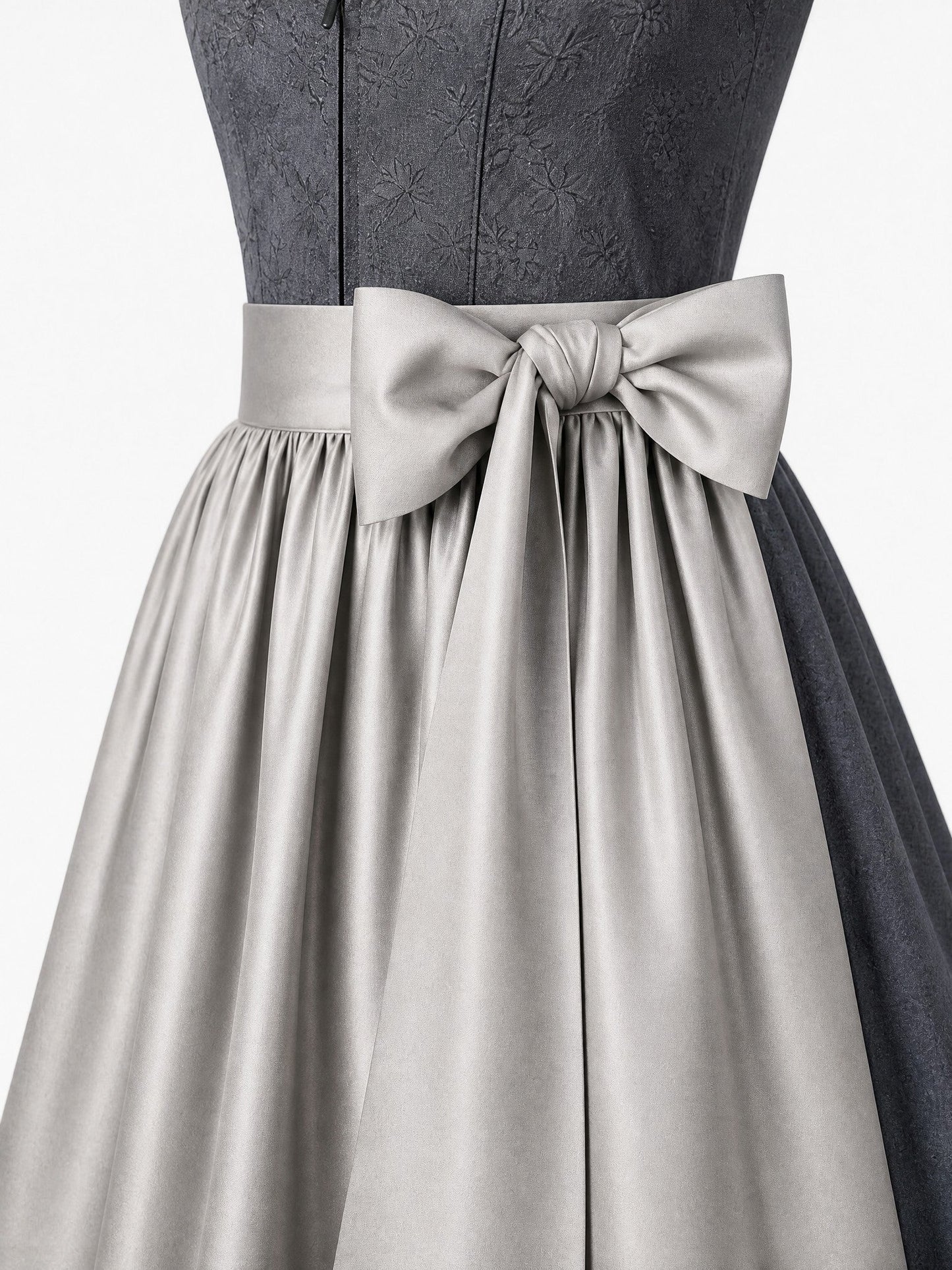 Dirndl Nela in Graphit mit Perlgrau Schürze - Detailansicht Taille und Schleife