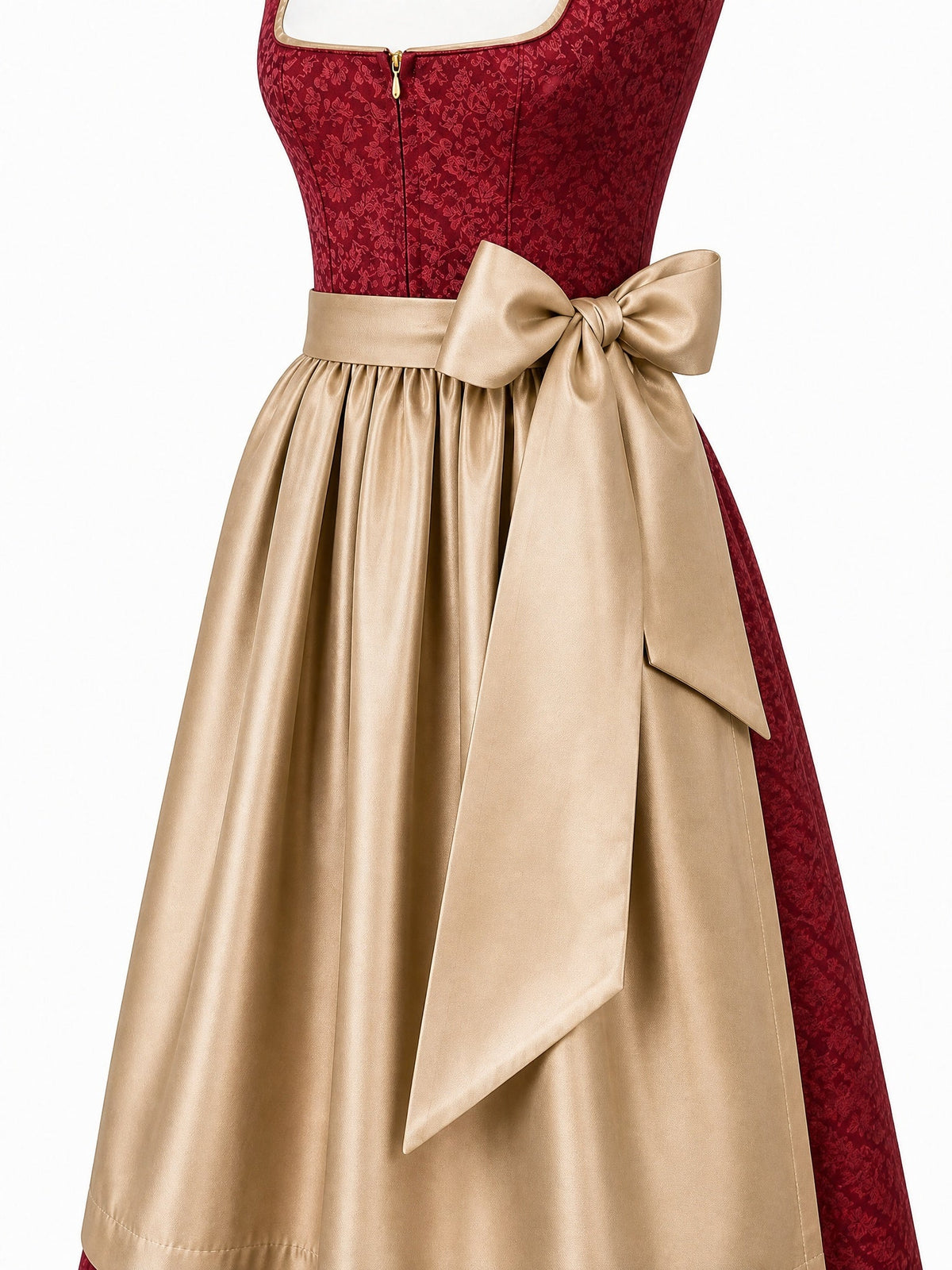 Dirndl Isabel in Cranberryrot mit Antikgold Schürze - Detailansicht Taille und Schleife
