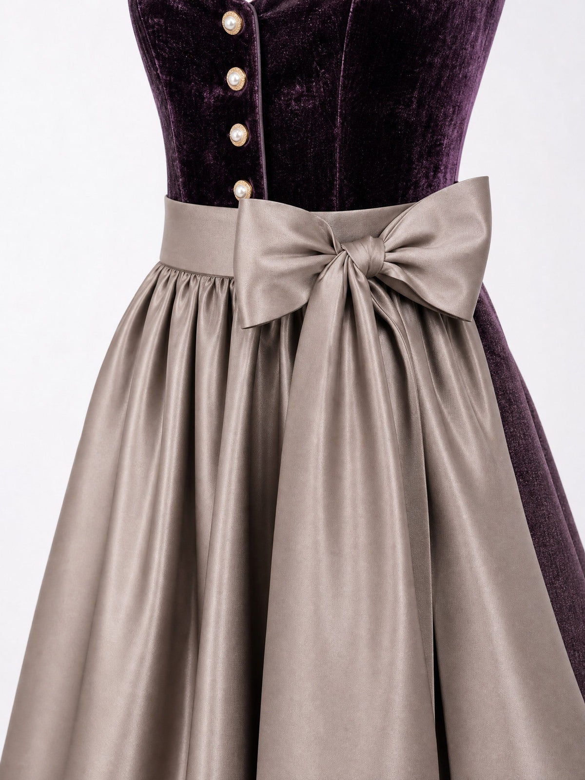 Dirndl Alina in Brombeere mit Taupe Schürze - Detailansicht Taille und Schleife